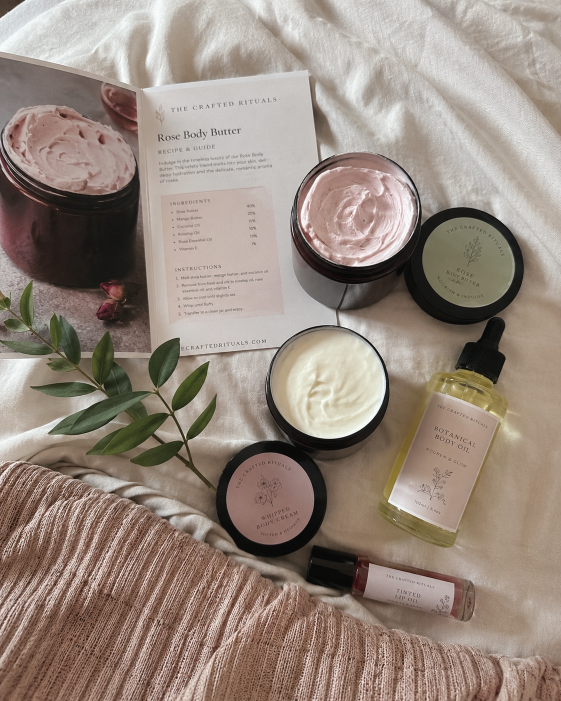 Real customer-style flatlay of The Crafted Rituals recipes and handmade body care products